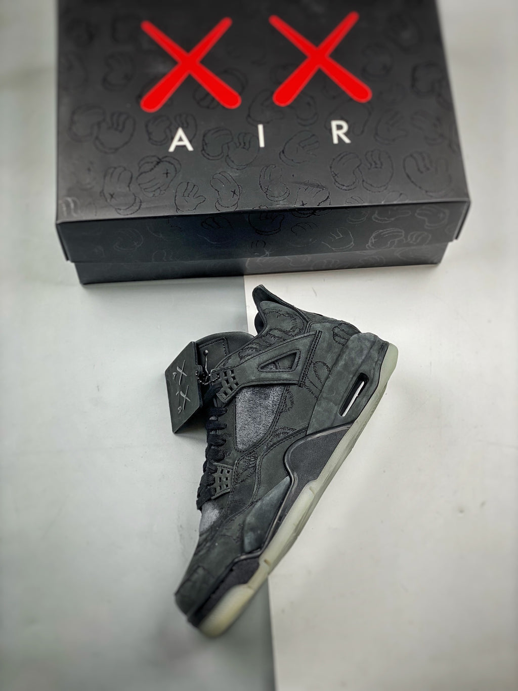 Jordan 4 Retro x KAWS 'Black'