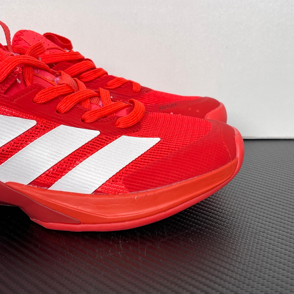 AD ADIZERO UBERSONIC 5 Tennis Shoes red and white