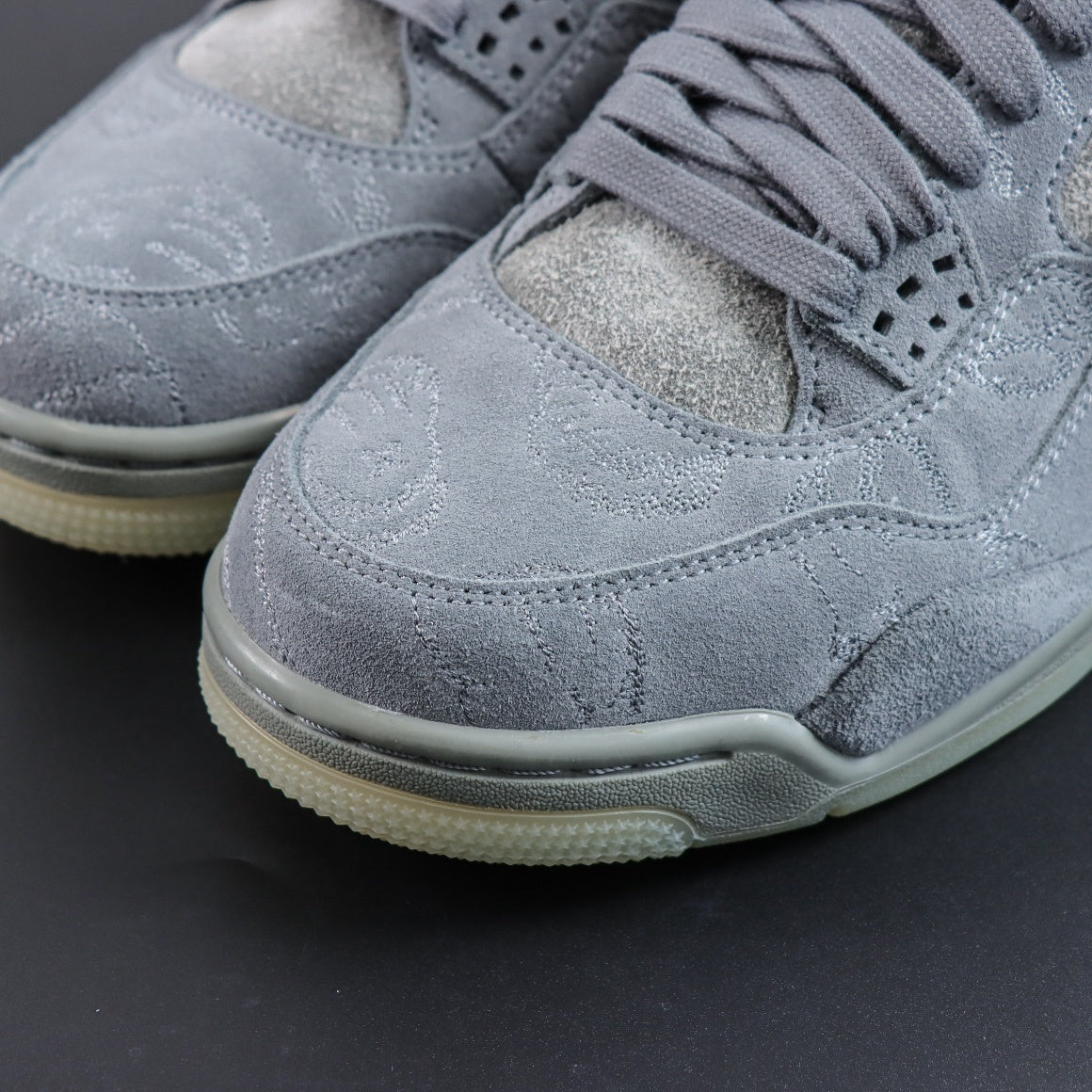 Jordan 4 Retro x KAWS 'Cool Grey'
