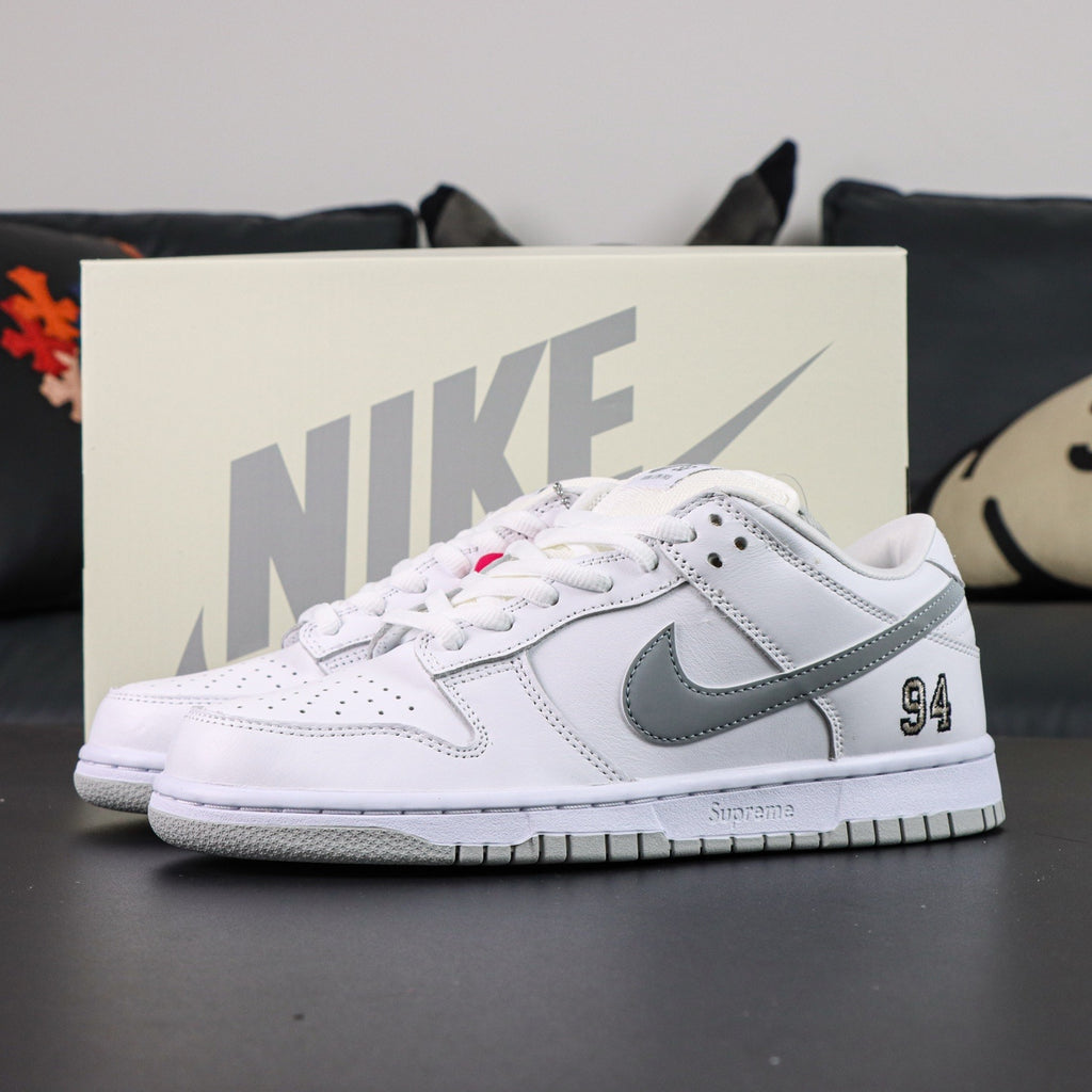 Nike SB Dunk  Low x Supreme "White Metallic Silver"