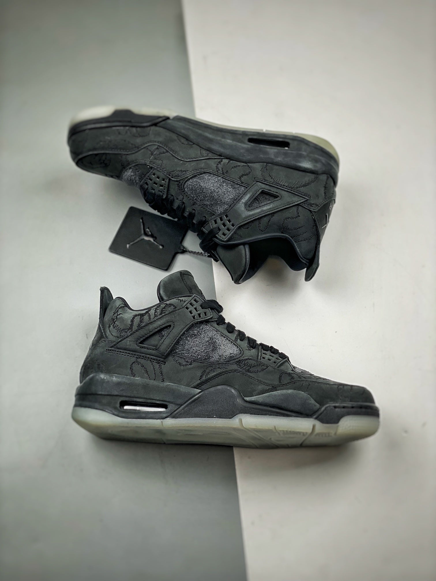 Jordan 4 Retro x KAWS 'Black'