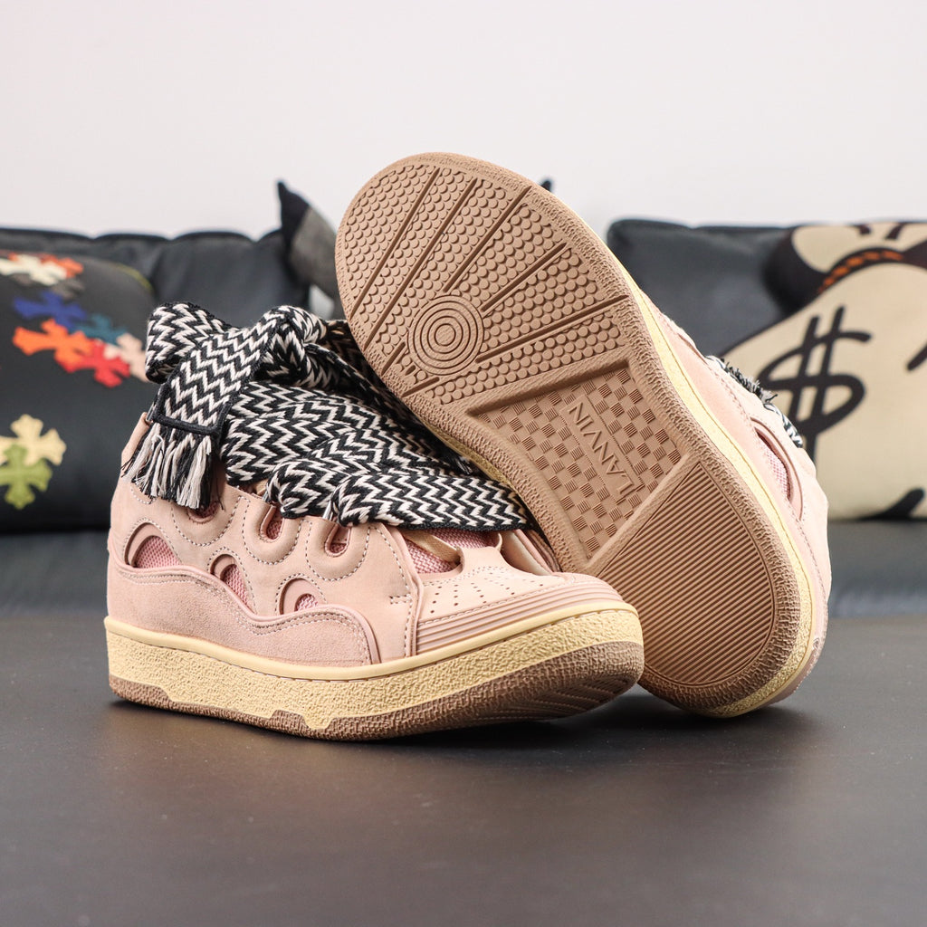 LANVIN SNEAKER  pink colorway, featuring an oversized padded tongue and wide black-and-white zigzag laces