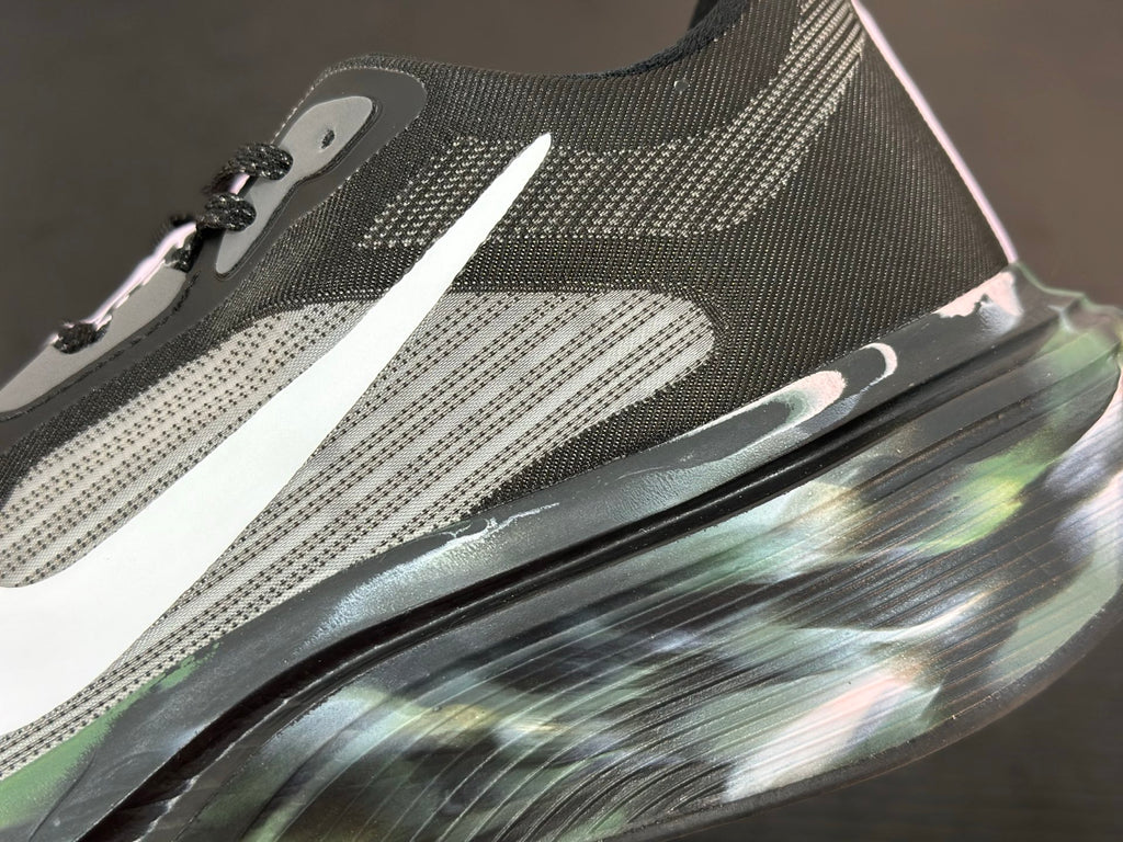 NIKE PEGASUS PREMIUN black and gray mesh upper, a white Nike swoosh, and a marbled
