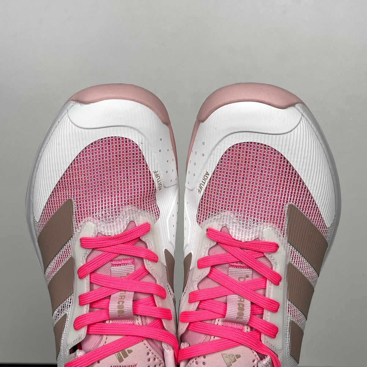 AD ADIZERO UBERSONIC 5 (in the Cloud White, Ash Pearl, and Lucid Pink / JP7313 colorway).