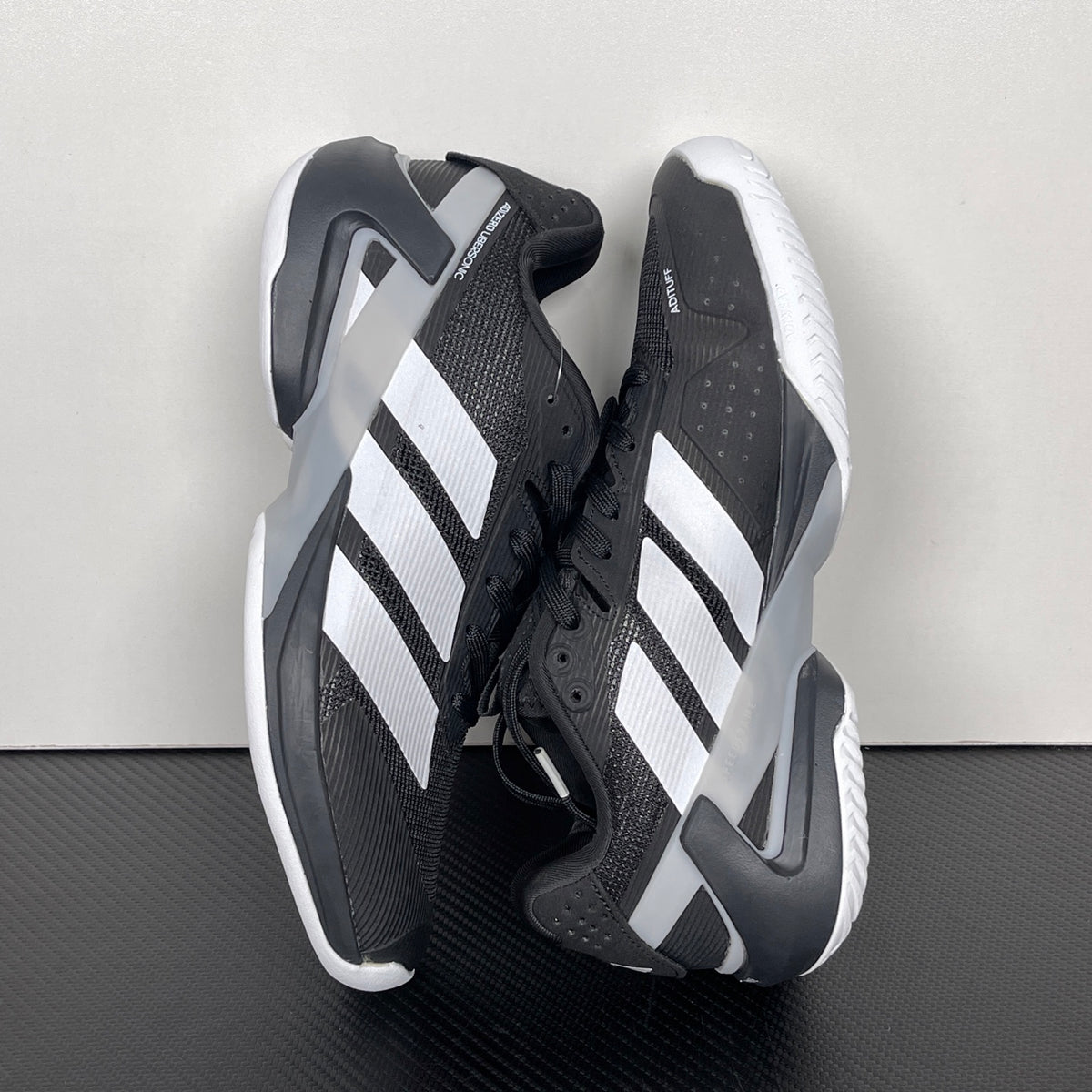 AD ADIZERO UBERSONIC 5 Tennis Shoes in Core Black / Zero Metallic / Silver Metallic