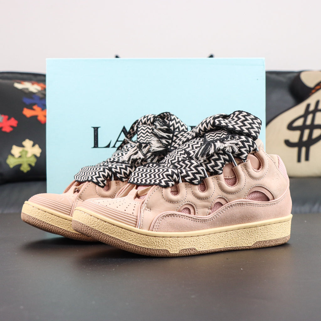 LANVIN SNEAKER  pink colorway, featuring an oversized padded tongue and wide black-and-white zigzag laces
