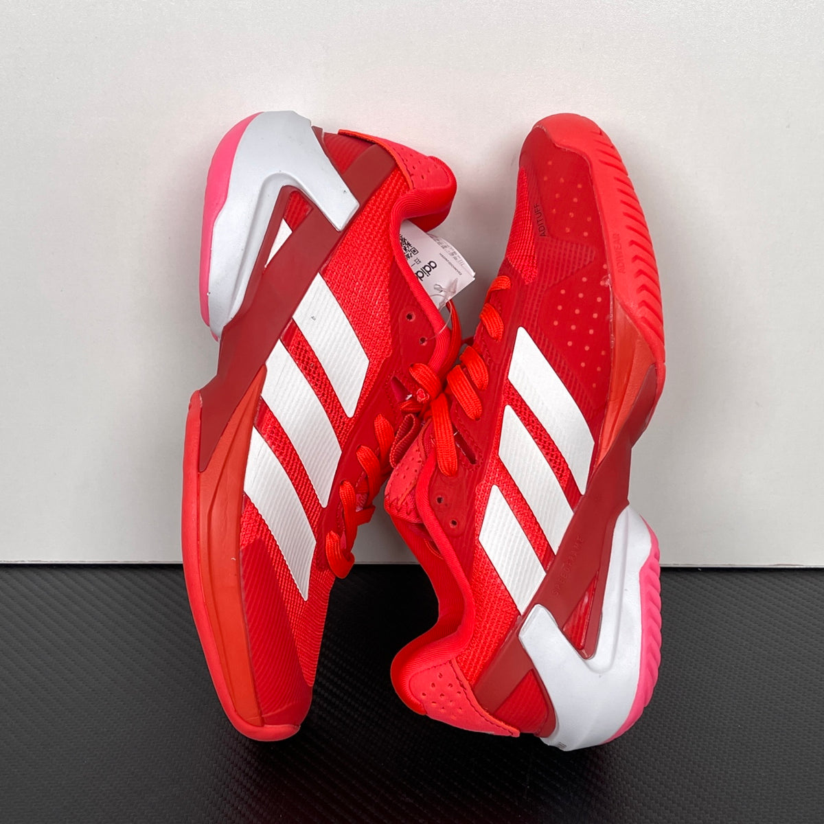 AD ADIZERO UBERSONIC 5 Tennis Shoes red and white