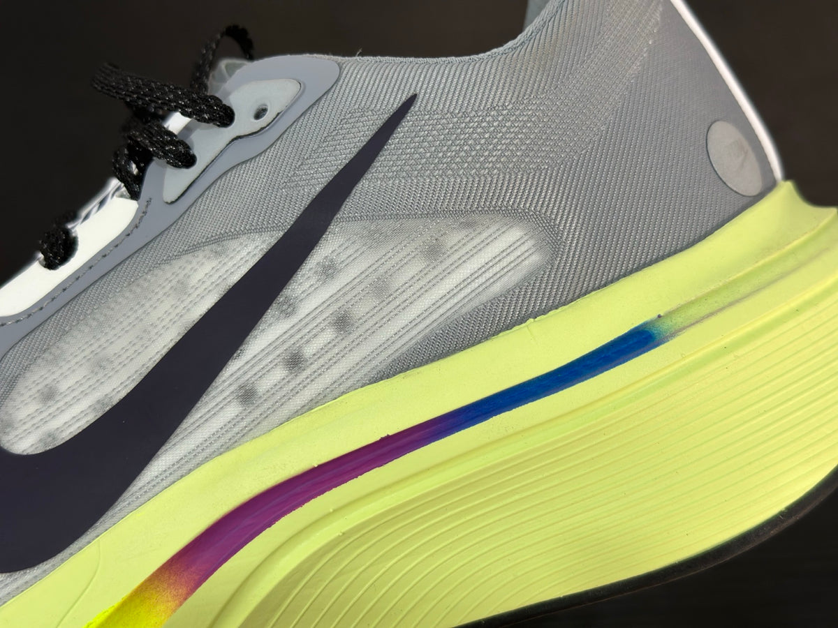 NIKE PEGASUS PREMIUN gray upper, black Swoosh, and a vibrant volt and purple