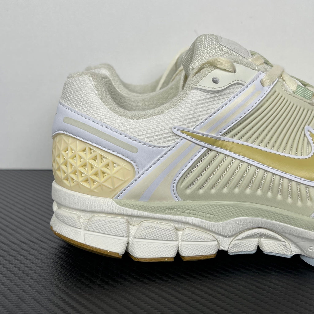 NIKE AIR ZOOM VOMERO 5 "Sail Buff Gold" cream and white mesh upper, buff gold Swoosh