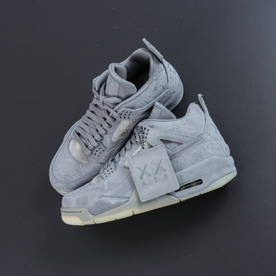 Jordan 4 Retro x KAWS 'Cool Grey'
