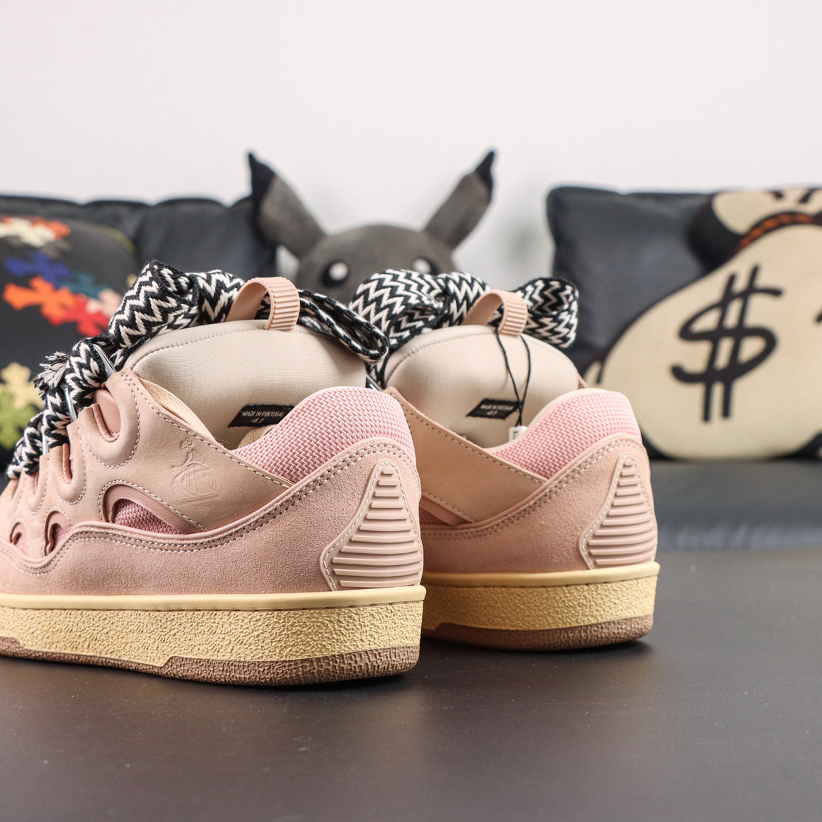 LANVIN SNEAKER  pink colorway, featuring an oversized padded tongue and wide black-and-white zigzag laces