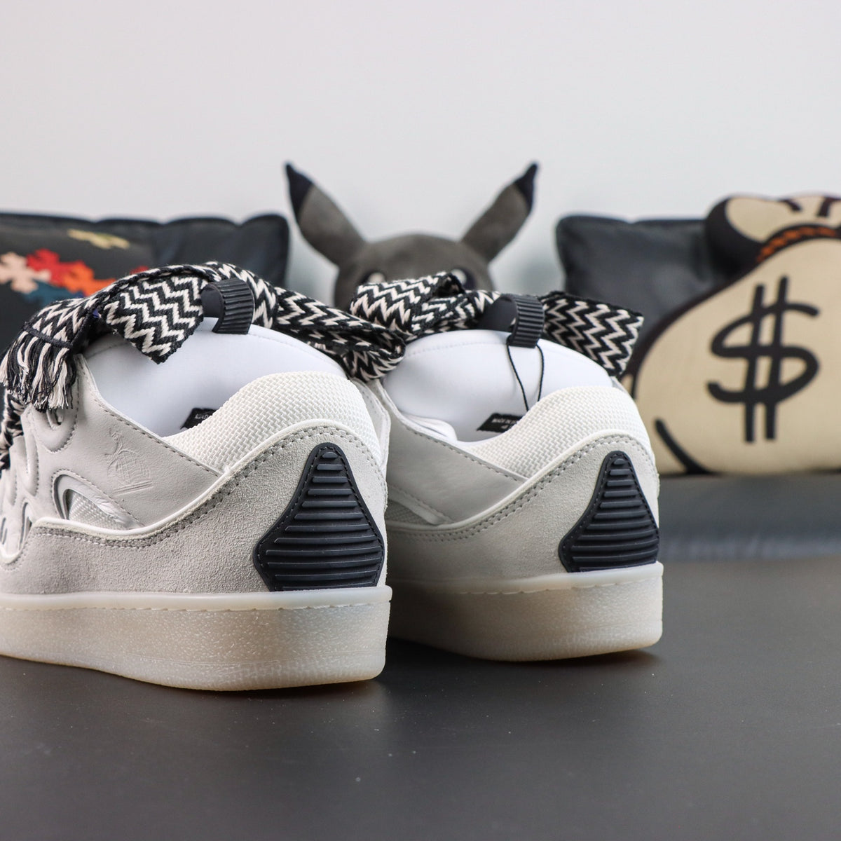 LANVIN SNEAKER white with oversized black-and-white zigzag-print laces and a transparent rubber sole