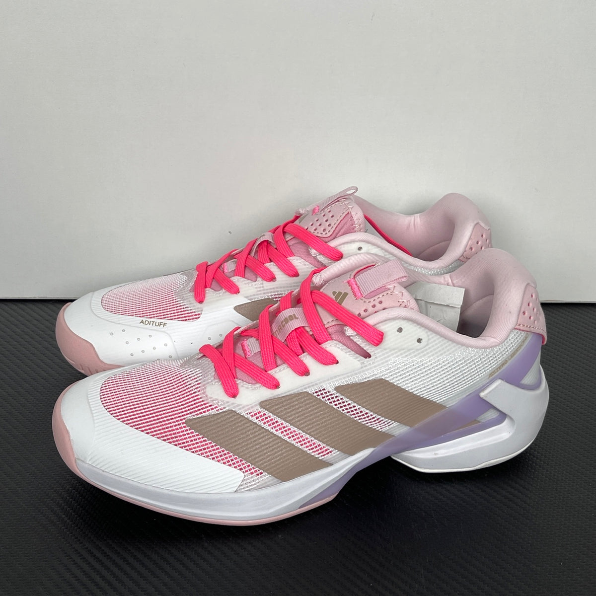 AD ADIZERO UBERSONIC 5 (in the Cloud White, Ash Pearl, and Lucid Pink / JP7313 colorway).