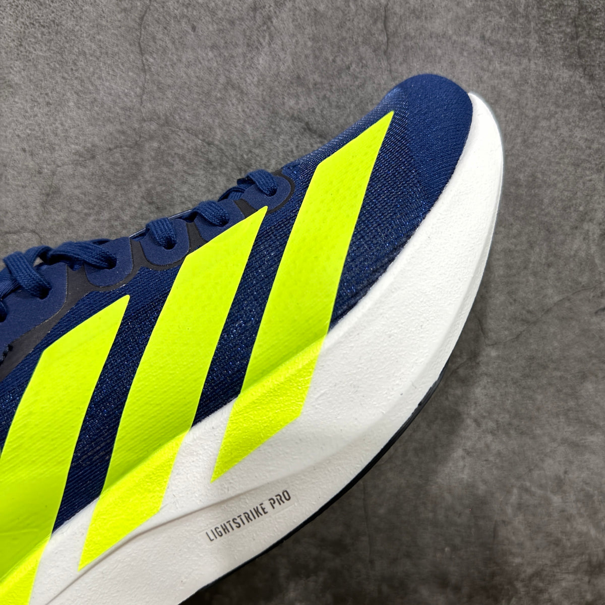 adidas Adizero Evo SL dark blue and solar slime/yellow