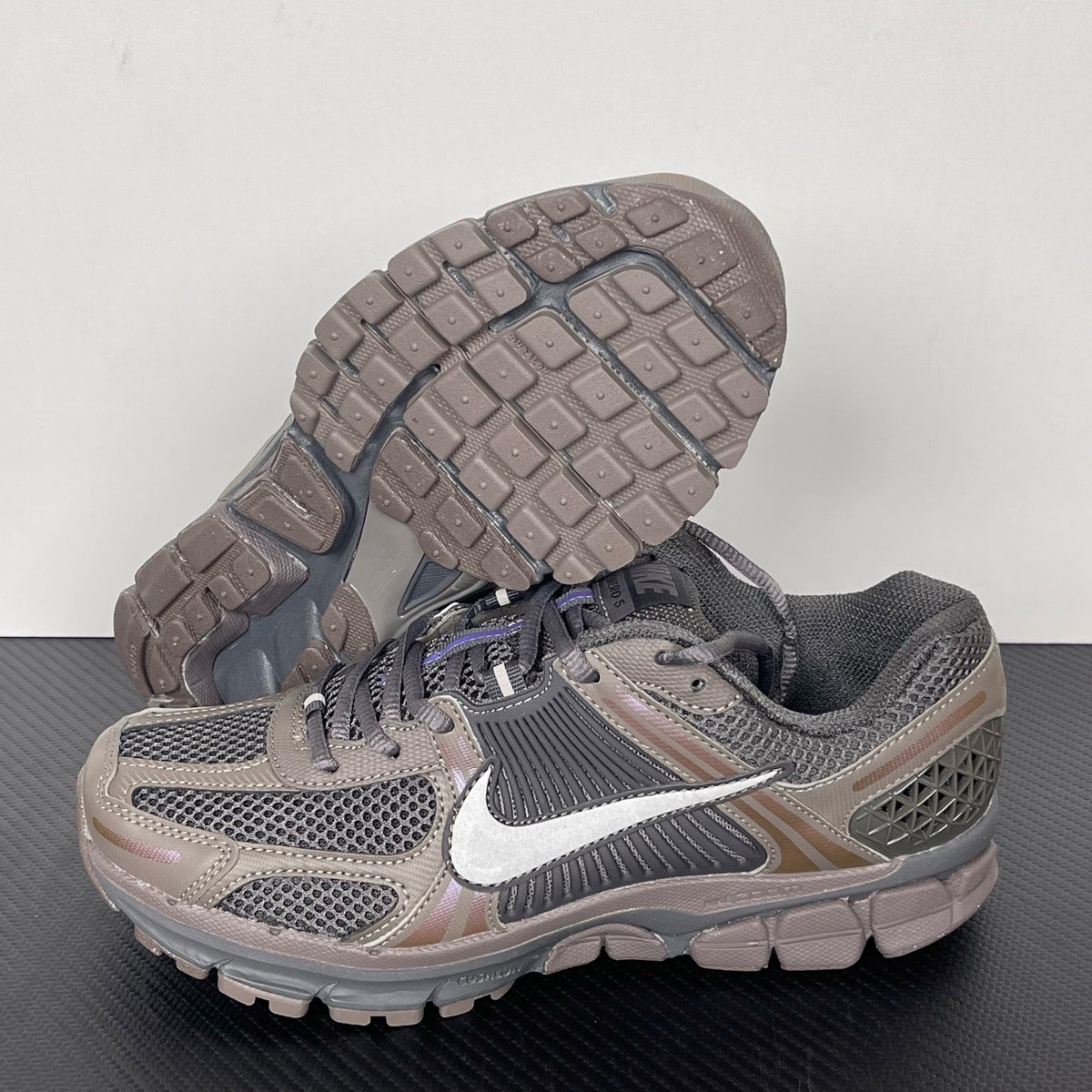 NIKE AIR ZOOM VOMERO 5 "Cave Stone" earth-toned mesh and leather layered upper with a reflective Swoosh