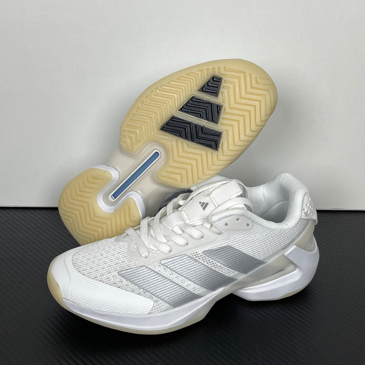 AD ADIZERO UBERSONIC 5 tennis shoes in the Cloud White / Silver Metallic