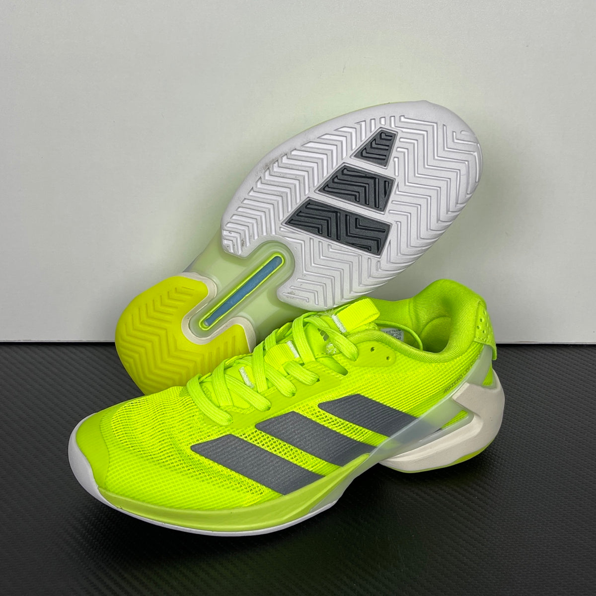 AD ADIZERO UBERSONIC 5 Tennis Shoes in the Lucid Lemon / Iron Metallic / Powder Yellow