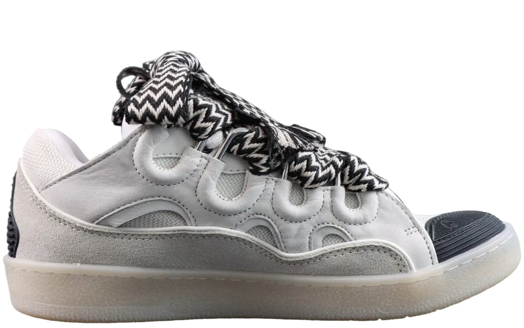 LANVIN SNEAKER white with oversized black-and-white zigzag-print laces and a transparent rubber sole