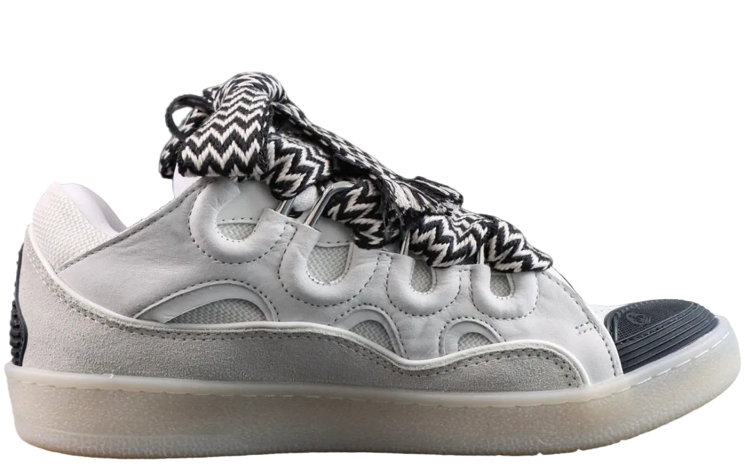 LANVIN SNEAKER white with oversized black-and-white zigzag-print laces and a transparent rubber sole