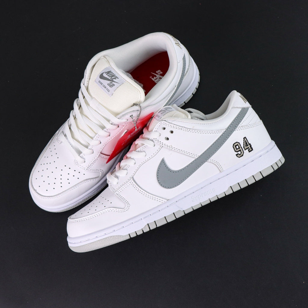 Nike SB Dunk  Low x Supreme "White Metallic Silver"