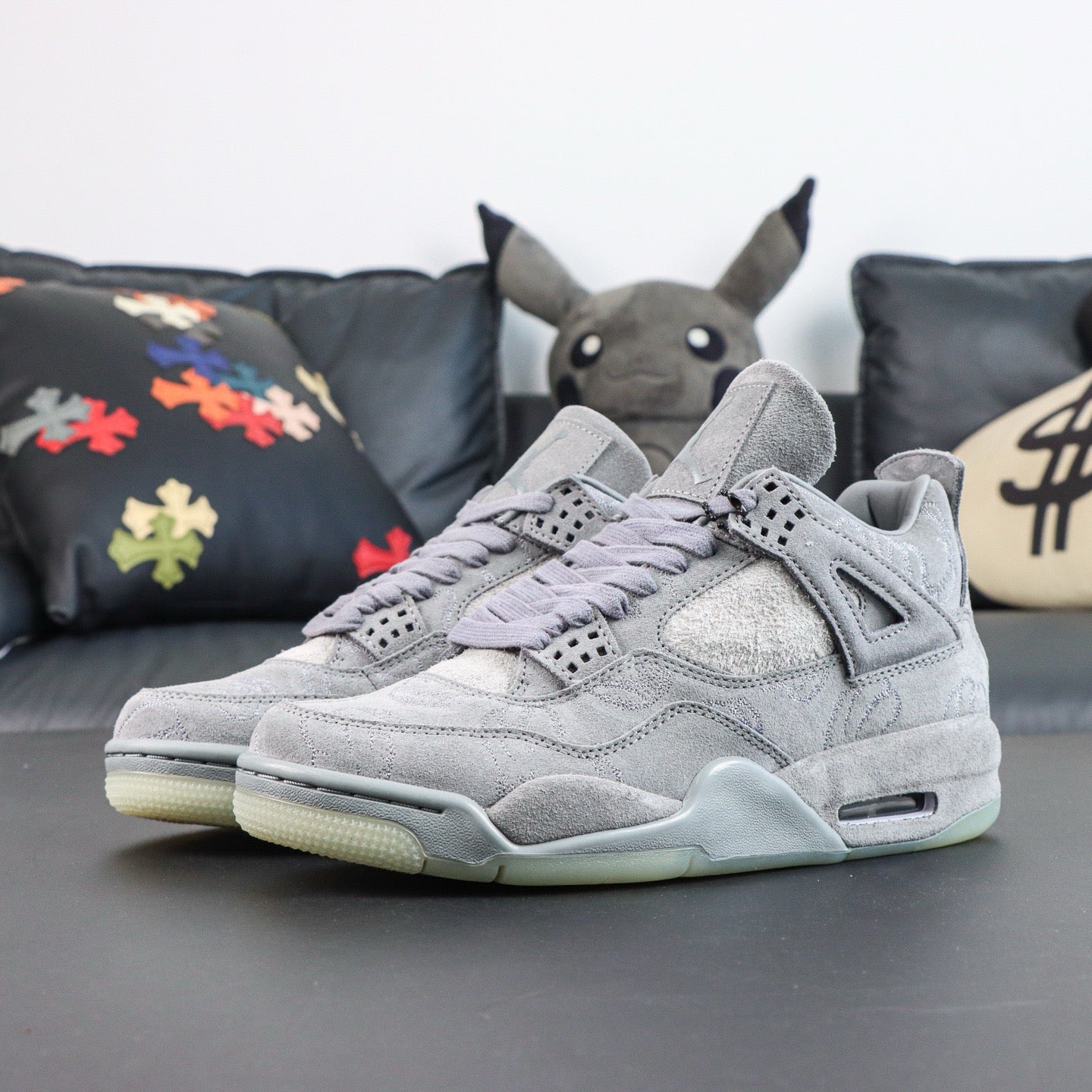 Jordan 4 Retro x KAWS 'Cool Grey'