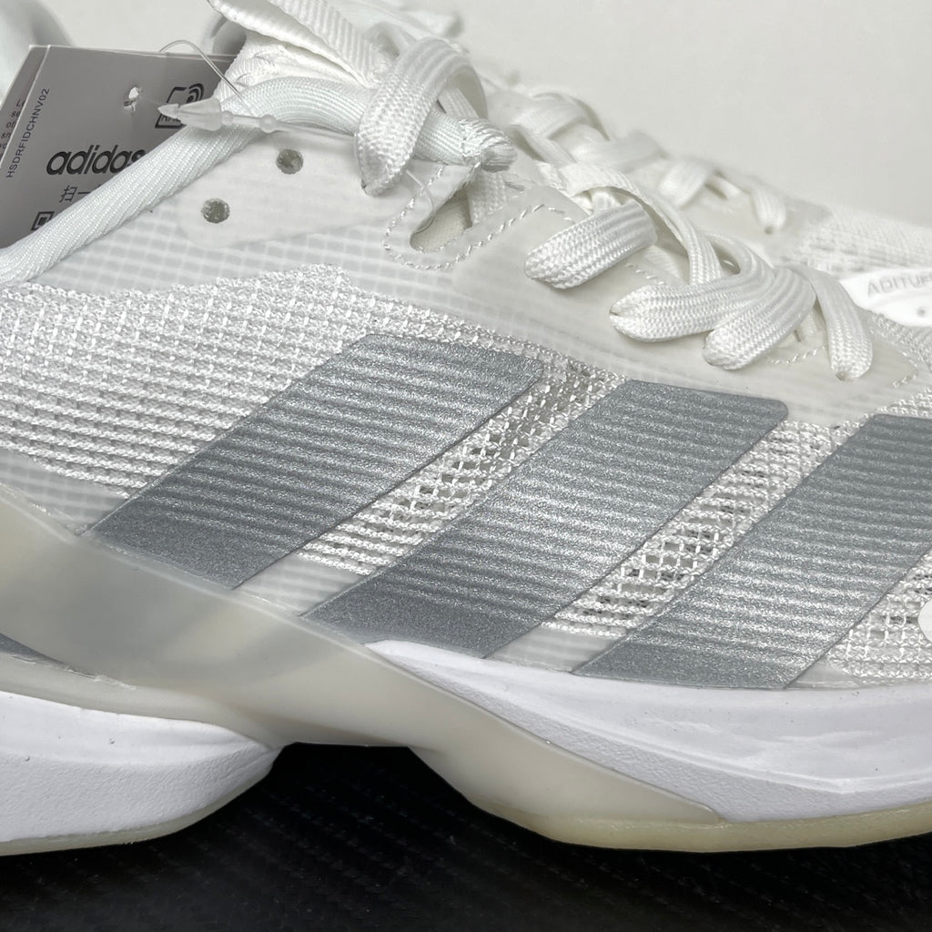 AD ADIZERO UBERSONIC 5 tennis shoes in the Cloud White / Silver Metallic