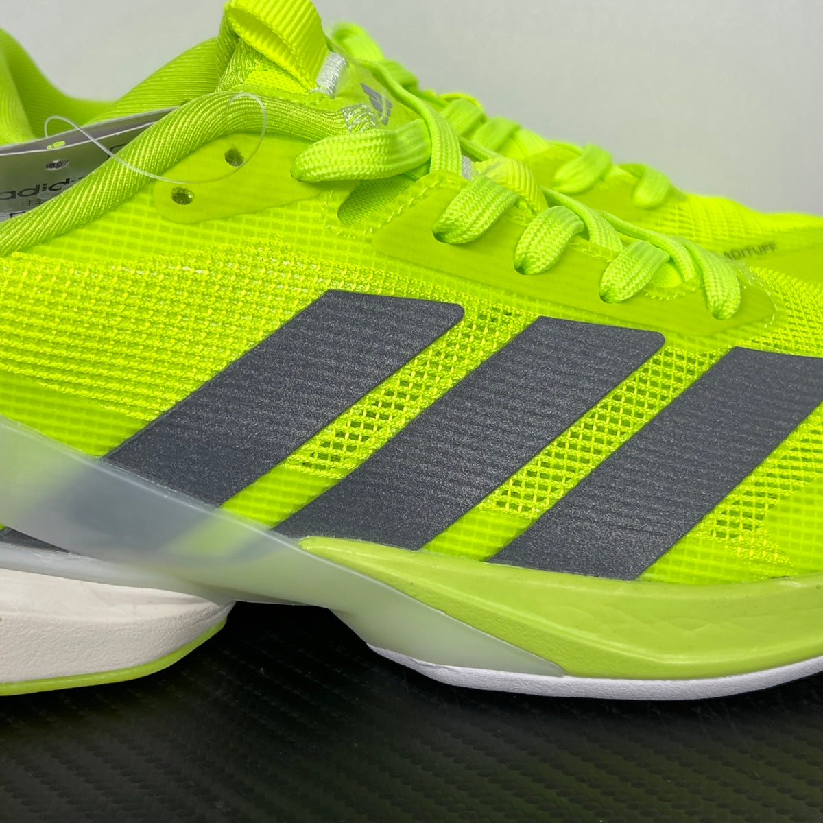 AD ADIZERO UBERSONIC 5 Tennis Shoes in the Lucid Lemon / Iron Metallic / Powder Yellow
