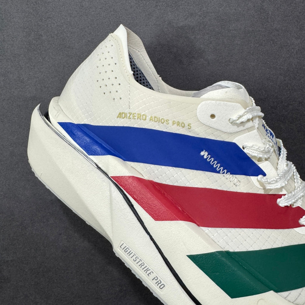 Adidas Adizero Adios Pro 5 white, blue, red, and green