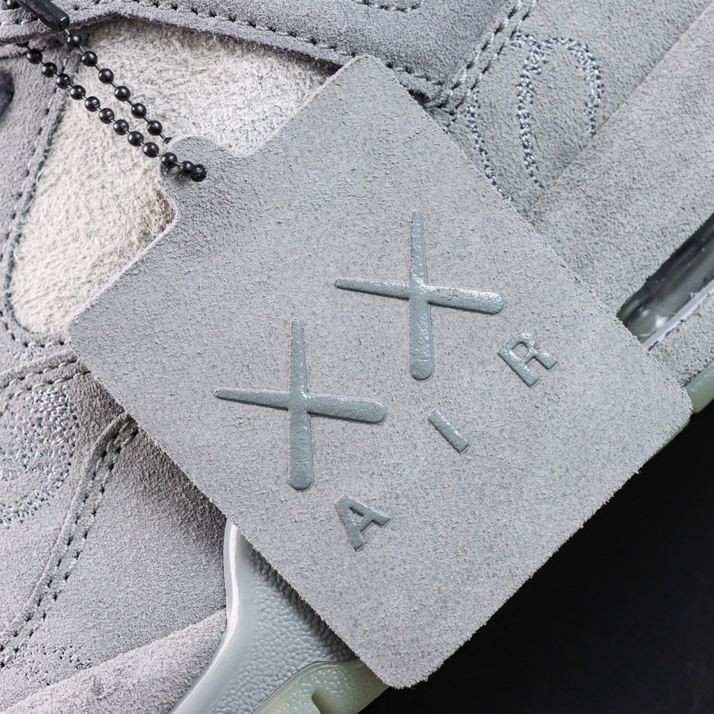 Jordan 4 Retro x KAWS 'Cool Grey'