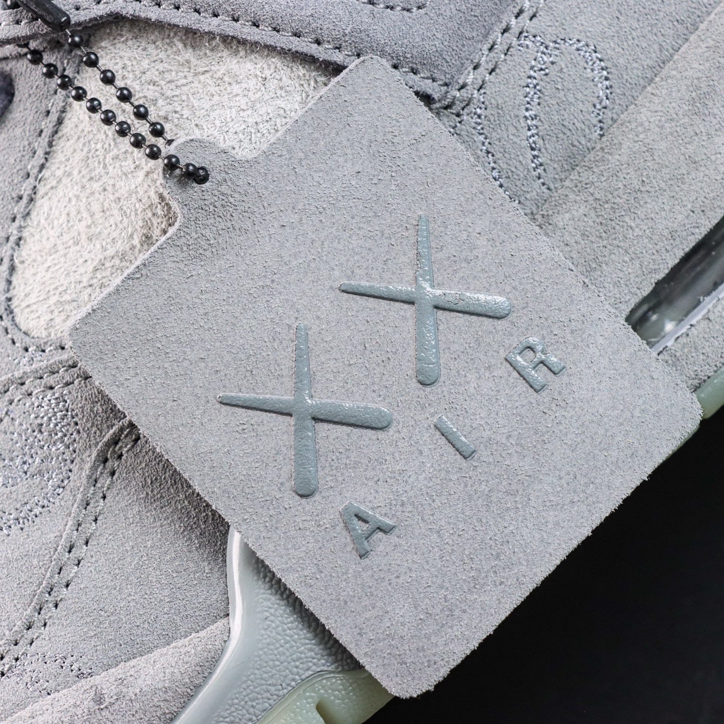 Jordan 4 Retro x KAWS 'Cool Grey'