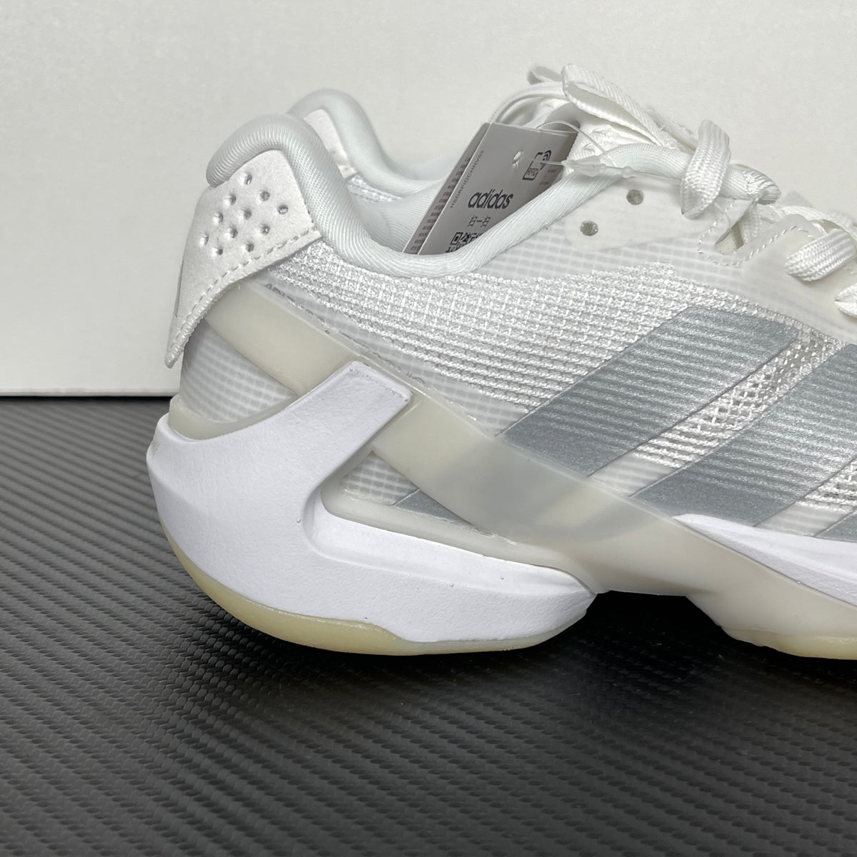 AD ADIZERO UBERSONIC 5 tennis shoes in the Cloud White / Silver Metallic