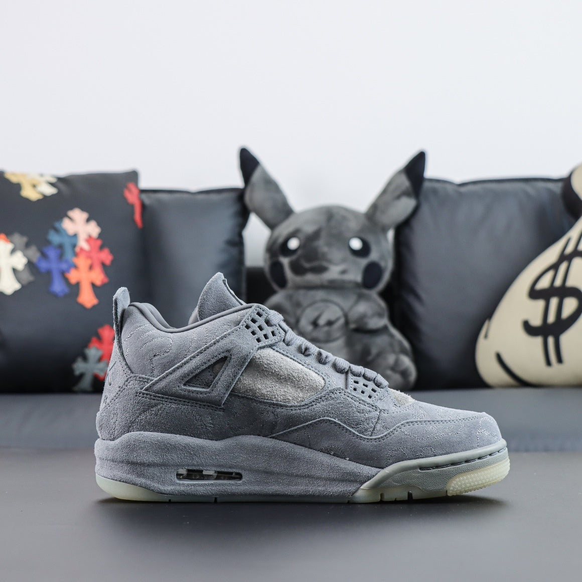 Jordan 4 Retro x KAWS 'Cool Grey'