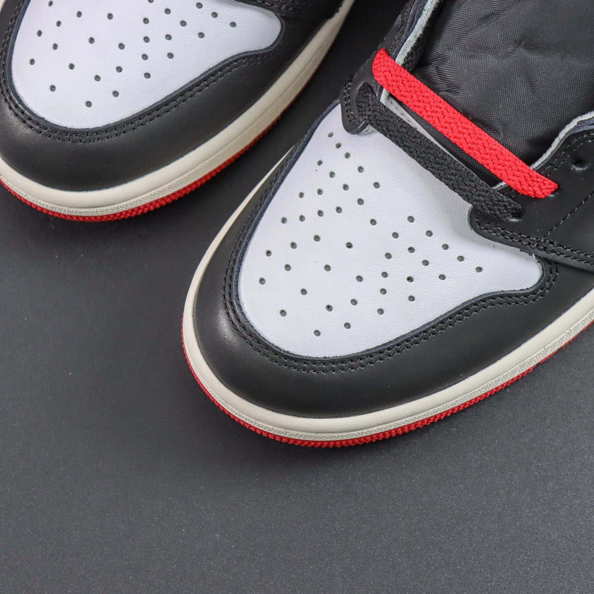 Jordan 1 Retro High OG 'Black Toe Reimagined'