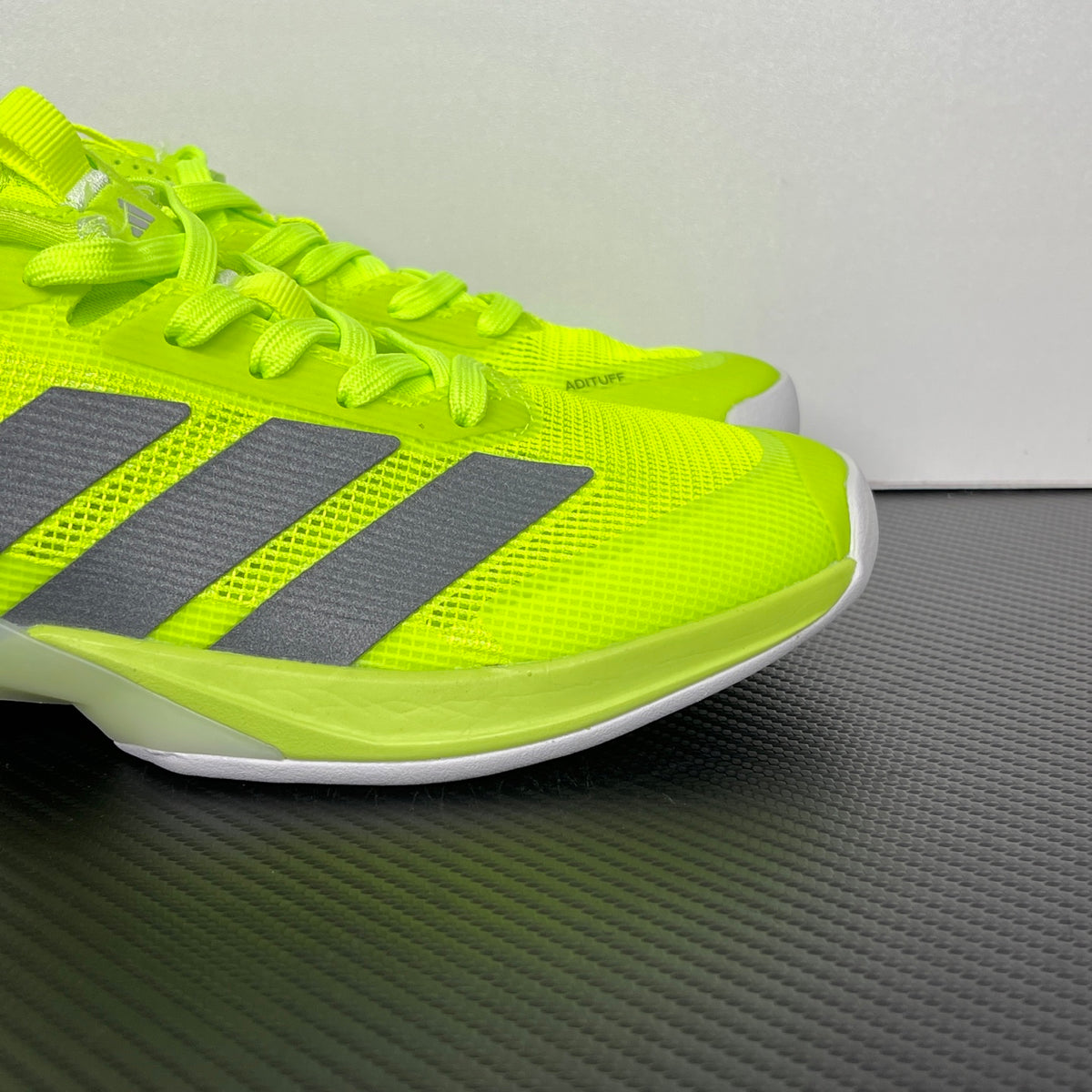 AD ADIZERO UBERSONIC 5 Tennis Shoes in the Lucid Lemon / Iron Metallic / Powder Yellow