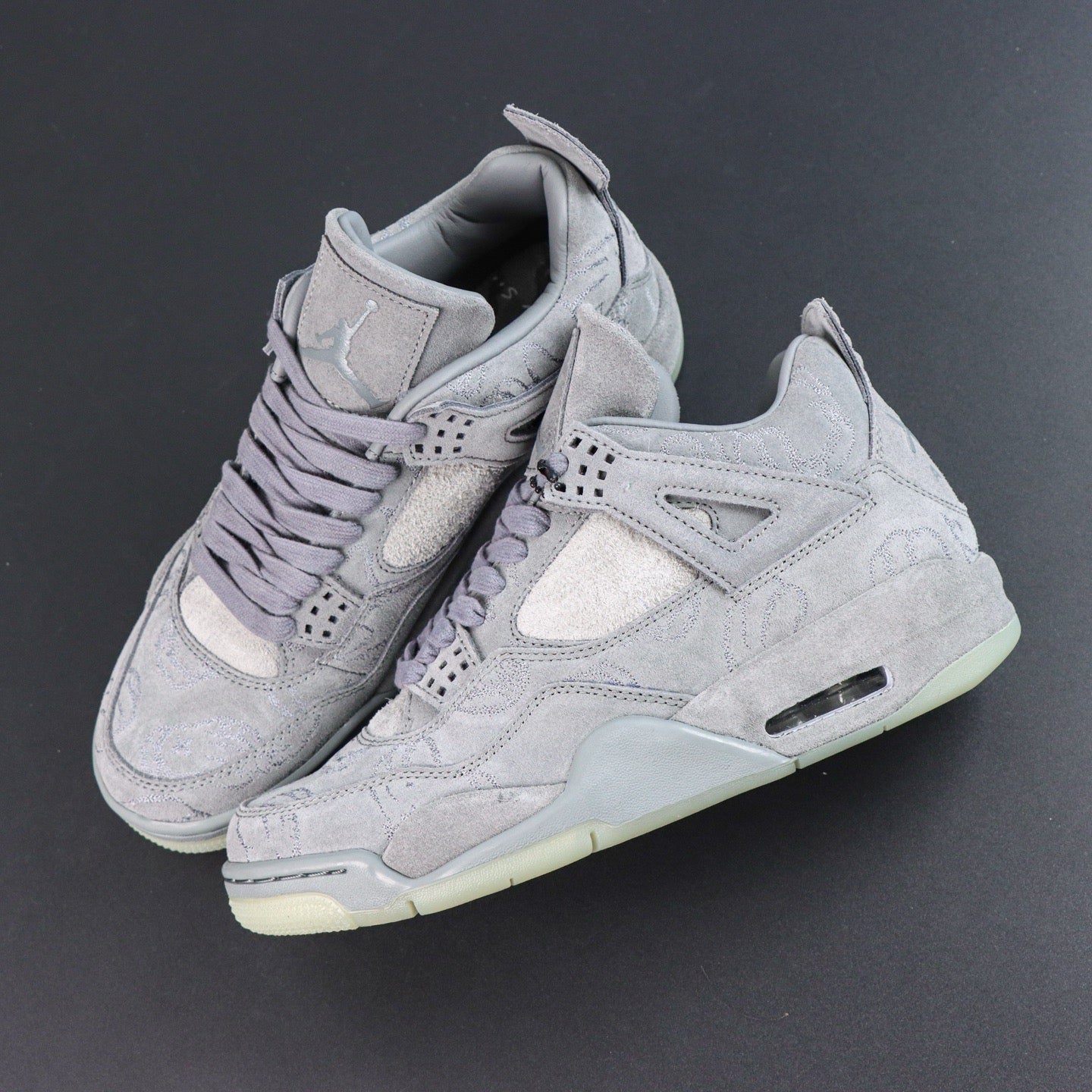 Jordan 4 Retro x KAWS 'Cool Grey'