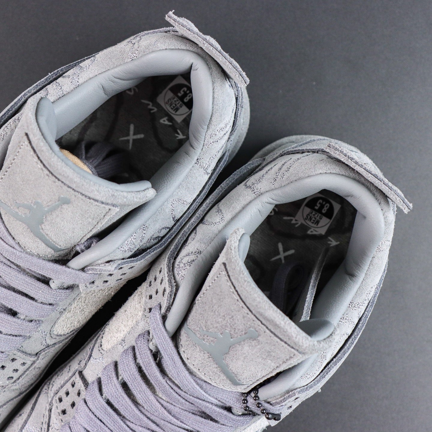 Jordan 4 Retro x KAWS 'Cool Grey'