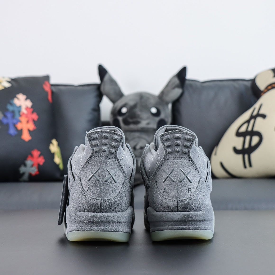 Jordan 4 Retro x KAWS 'Cool Grey'