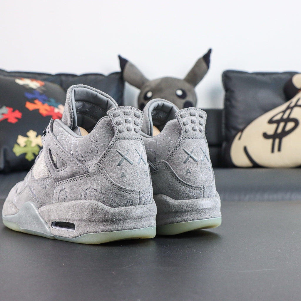 Jordan 4 Retro x KAWS 'Cool Grey'