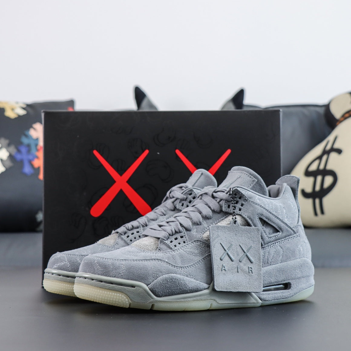 Jordan 4 Retro x KAWS 'Cool Grey'