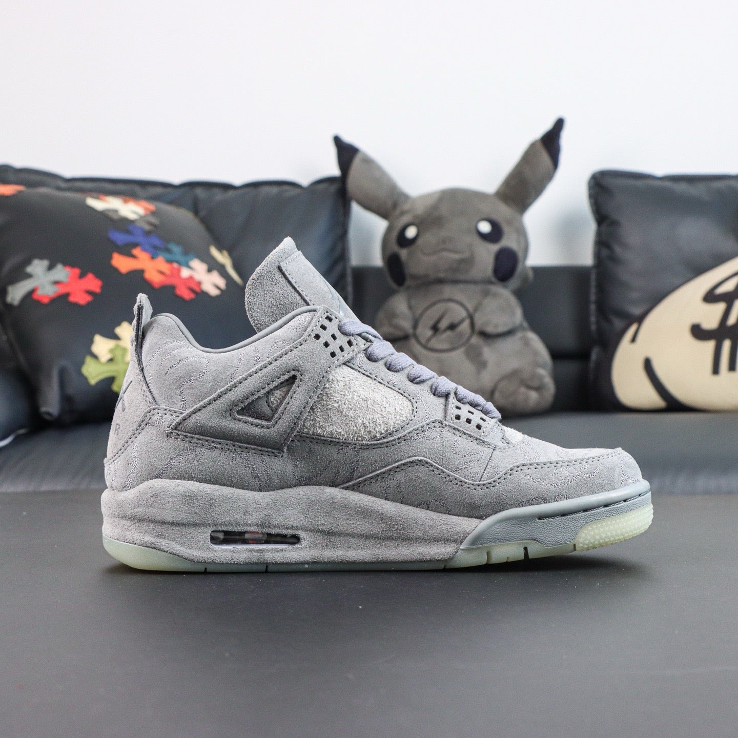 Jordan 4 Retro x KAWS 'Cool Grey'