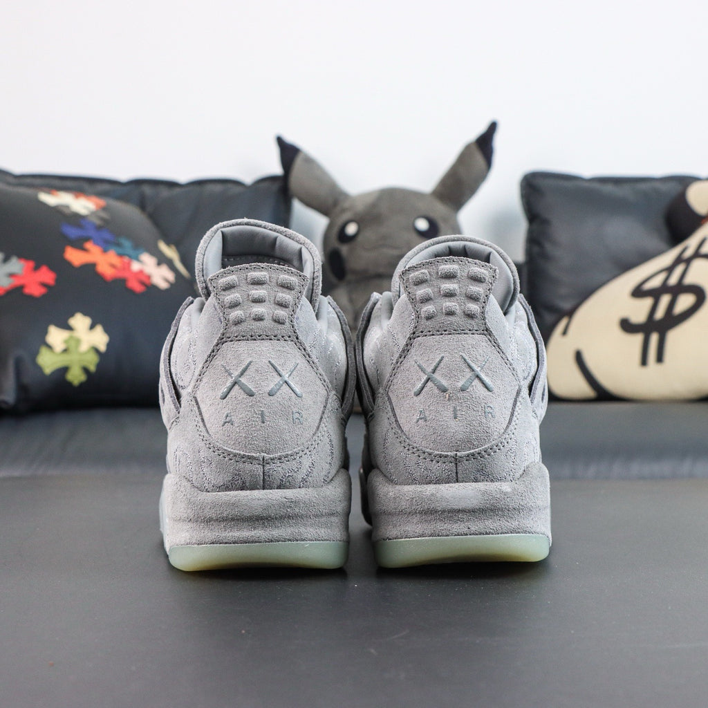 Jordan 4 Retro x KAWS 'Cool Grey'