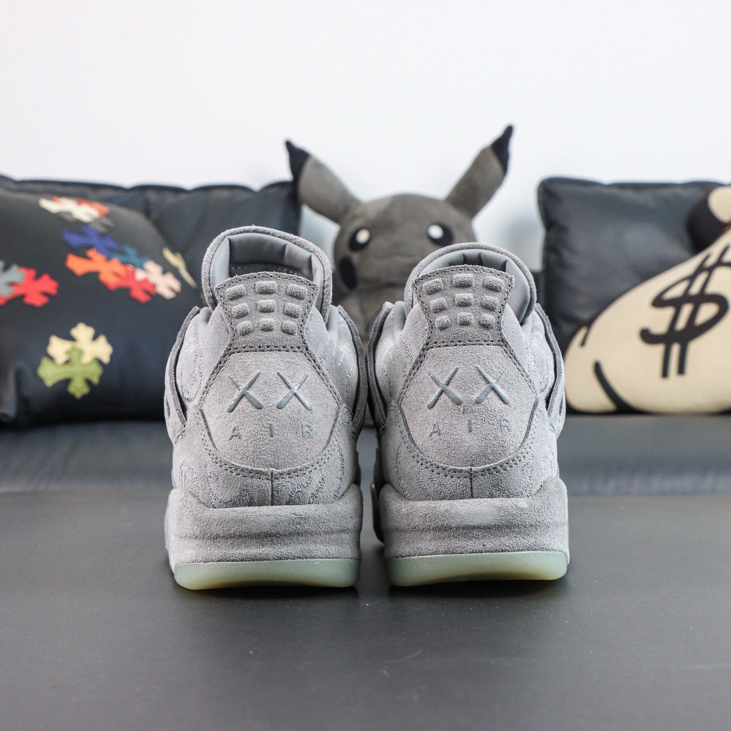 Jordan 4 Retro x KAWS 'Cool Grey'