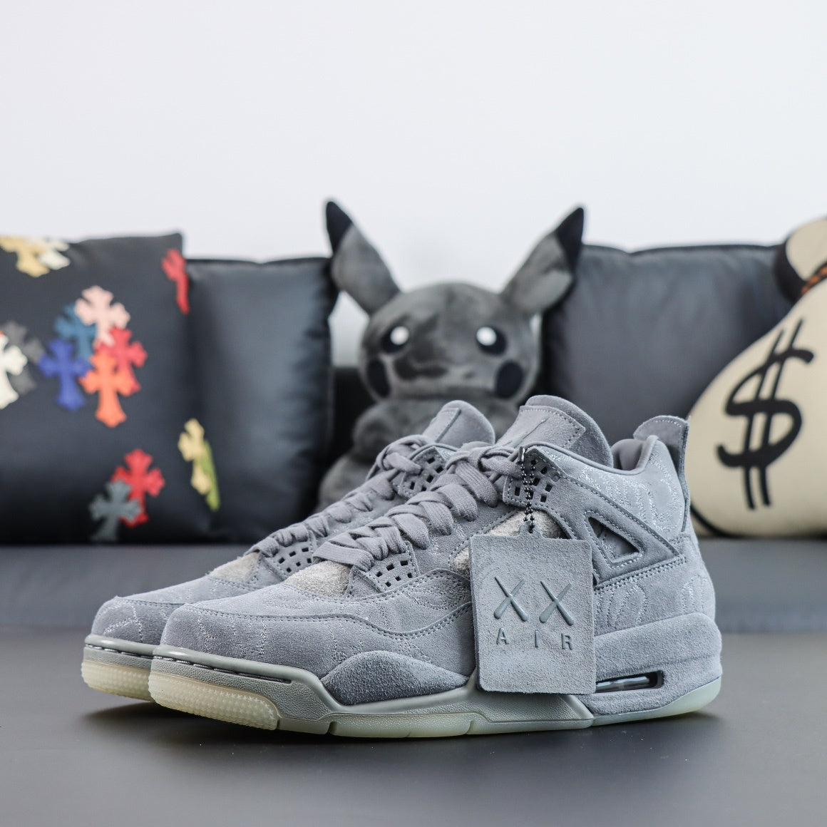 Jordan 4 Retro x KAWS 'Cool Grey'