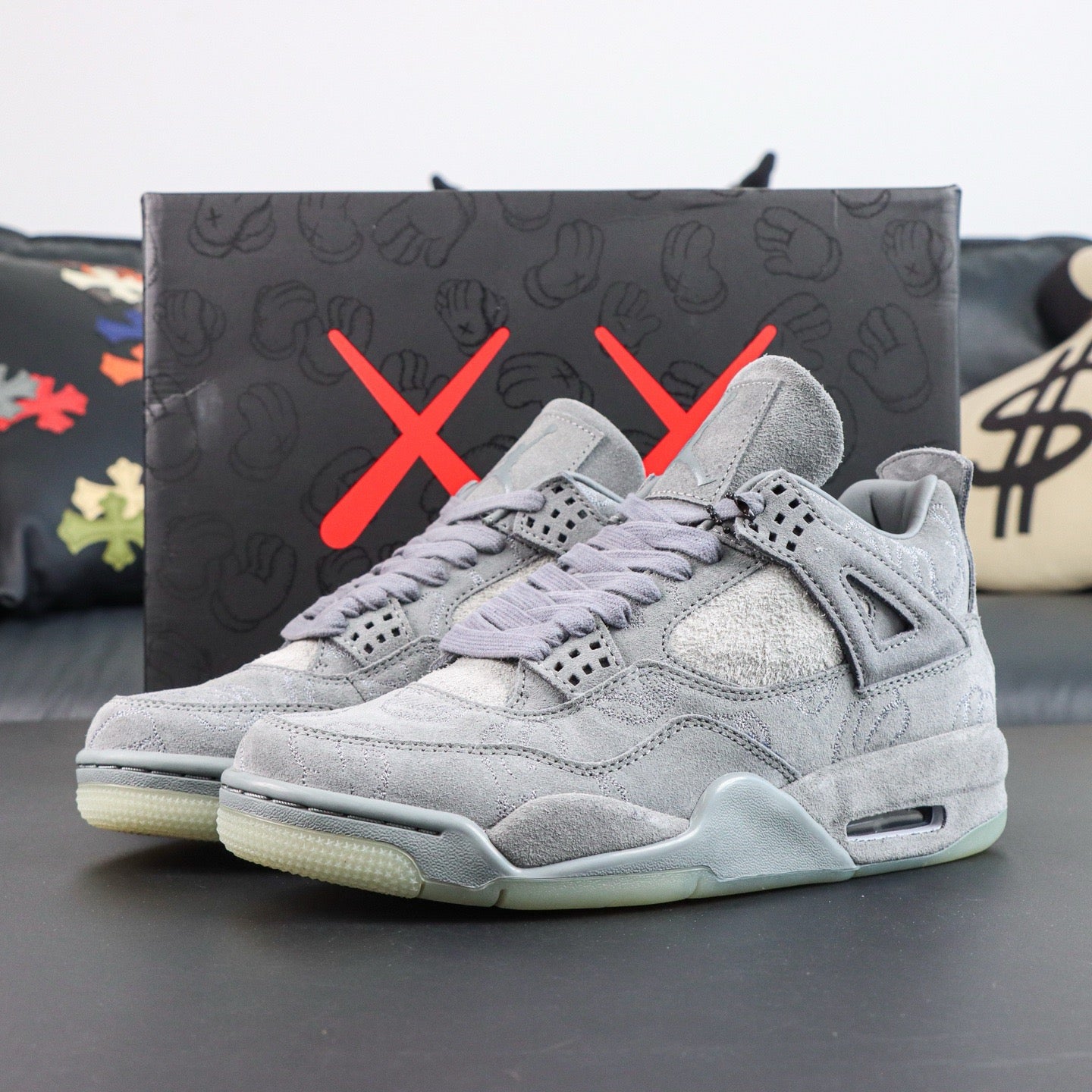 Jordan 4 Retro x KAWS 'Cool Grey'